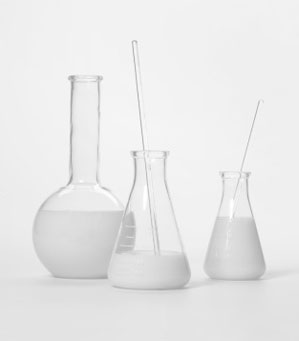Image test tubes and beakers. The image is used to depict Training Central's brand strategy, which guides the production of our learning and development materials.materials.